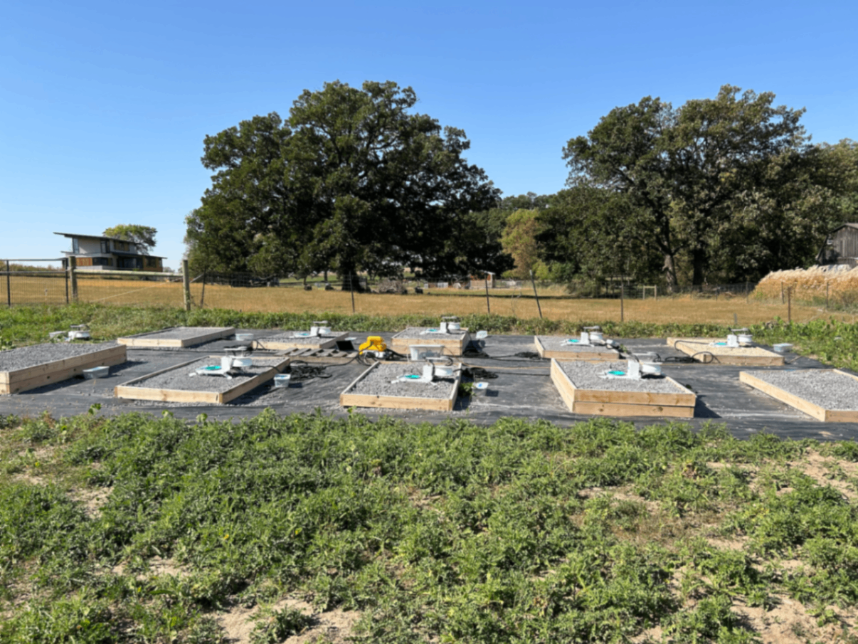 We have been monitoring different steel slag gravel deployments at our sentinel research site all summer. Understanding how different blends of materials and different deployment characteristics affect CO2 removal rates and capacities is critical to ensuring that our full-scale projects are optimized. Each test pad is outfitted with a gas flux monitoring system, temperature and moisture probes, and sub-pad soil lysimeters. With this equipment, we're tracking hourly CO2 removal rates, gravel conditions, and leachate chemistries. 