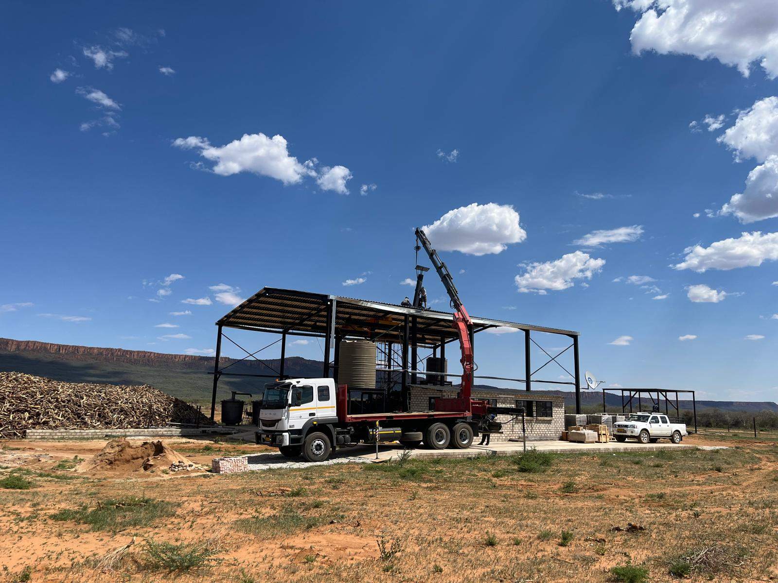 Checking in with the latest progress report from our new plant in Nog Verder near Otjiwarongo in Namibia. While we had already completed the infrastructure a while ago, this week we received our proprietary PyroCCS SCB plant on site. Setup will be completed within a week and we will fire up the plant by first week of January - after the Namibian holidays. Biomass is  on site and hiring of the team is currently going on. Certification under the Global Biochar C-Sink of Carbon Standards International is planned for February. All is well on track to be will within a timeline of six months from receiving funding to first carbon credit generation.